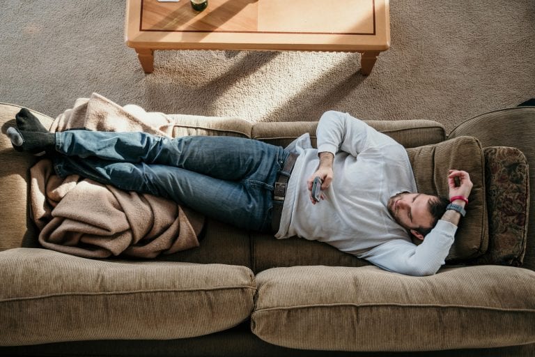 Man laying on couch