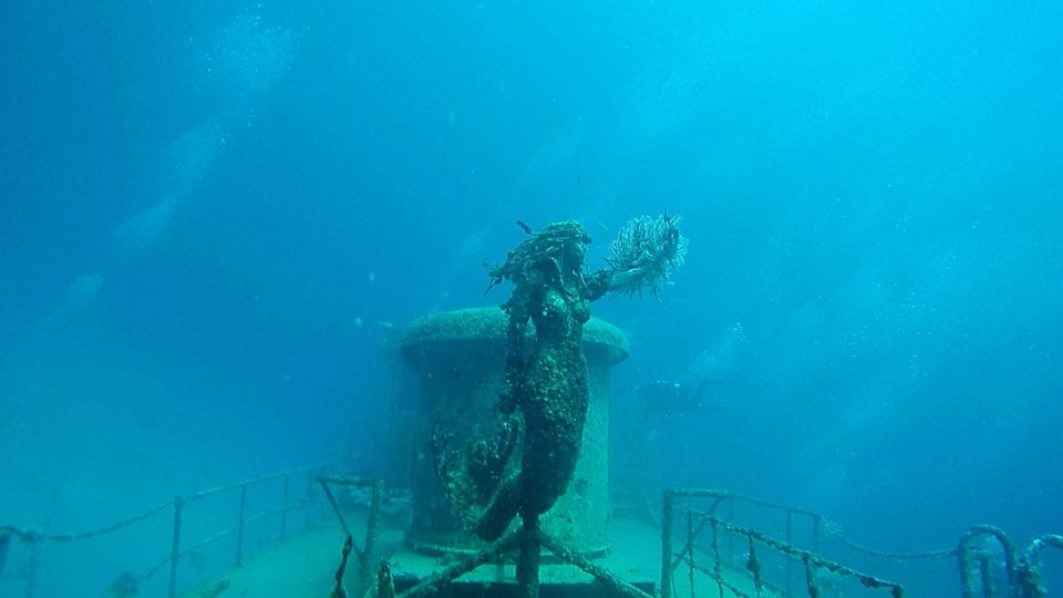 Mermaid statue from diving the Okinawa Wreck