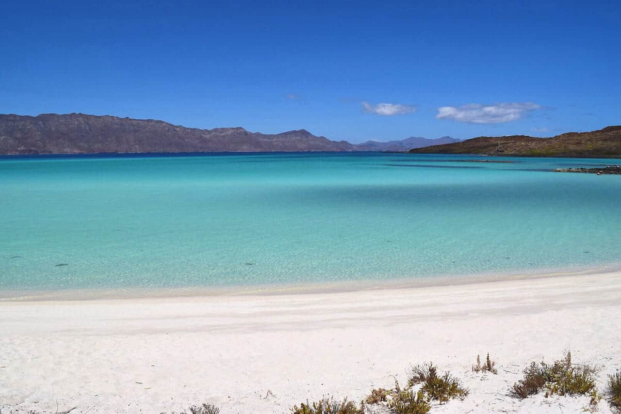 A kaleidoscope of blue sky, aquamarine water, and white sand in Loreto Bay