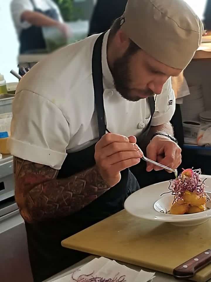 The finishing touch to this romantic meal was a real flower blossom placed by tweezers 