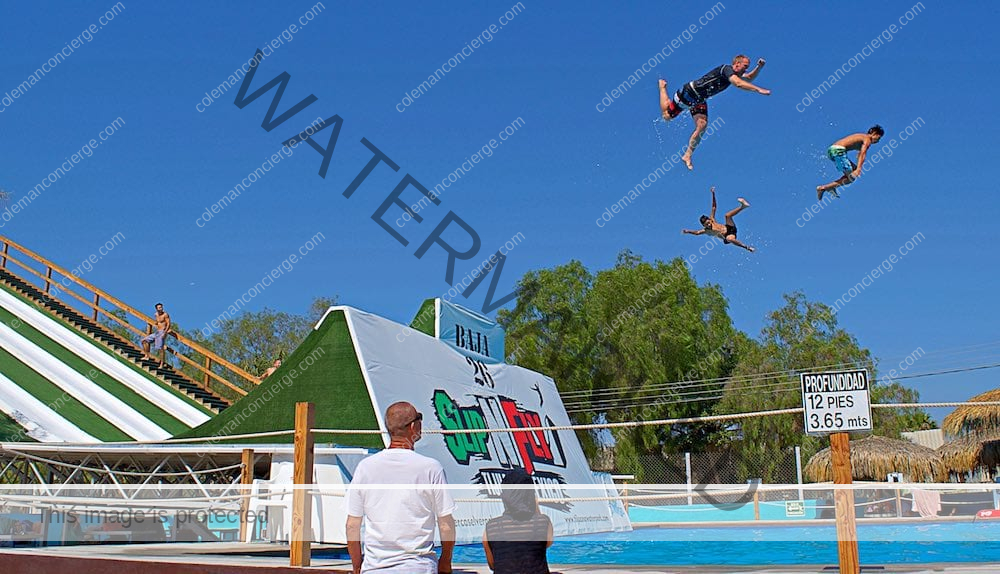 Group flight off the Slip and Fly at Albercas Vergel Tijuana waterpark.