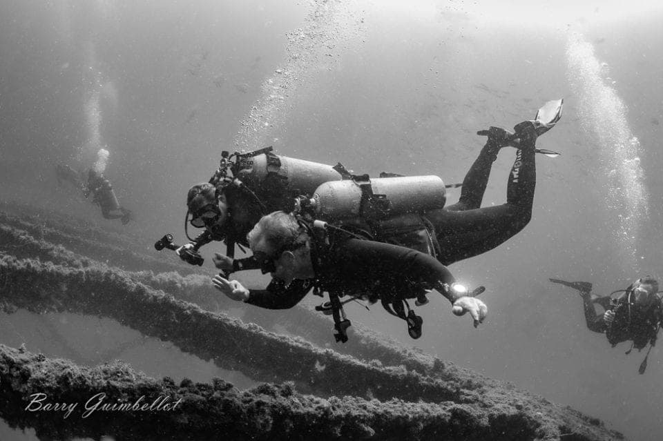 A good group of dive buddies makes all the difference  via Barry Guimbellot
