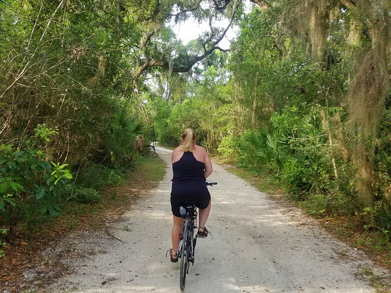 Jenn biking the South Loop on Jekyll Island