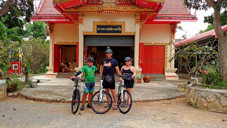 Jenn, Ed, and Tick at Khoa Tao Temple getting ready to cycle at Khao Tao Temple