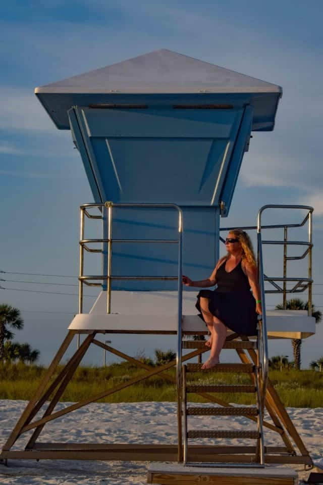 Jenn on lifeguard tower at Panama City Beach (photo by Adam@GettingStamped)