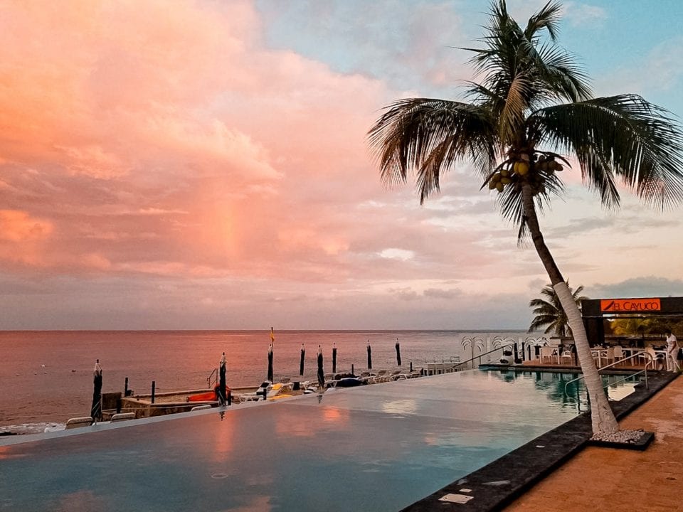 Sunset over pool at Coral Sands Cozumel