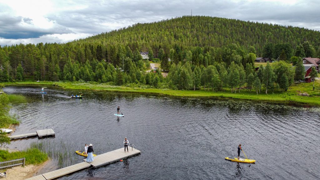Drone shot of paddle boarding on on lake Immeljärvi