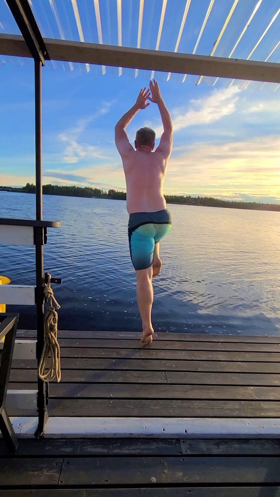 Ed jumping in the lake after the sauna Levi Finland