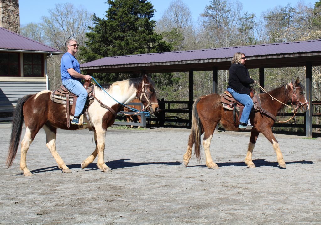 Jenn and Ed on horses Brasstown - courtesy of Jane Bozza