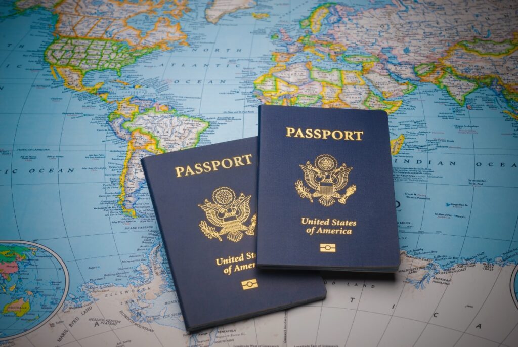 2 passports on a map symbolizing minimizeing travel risks