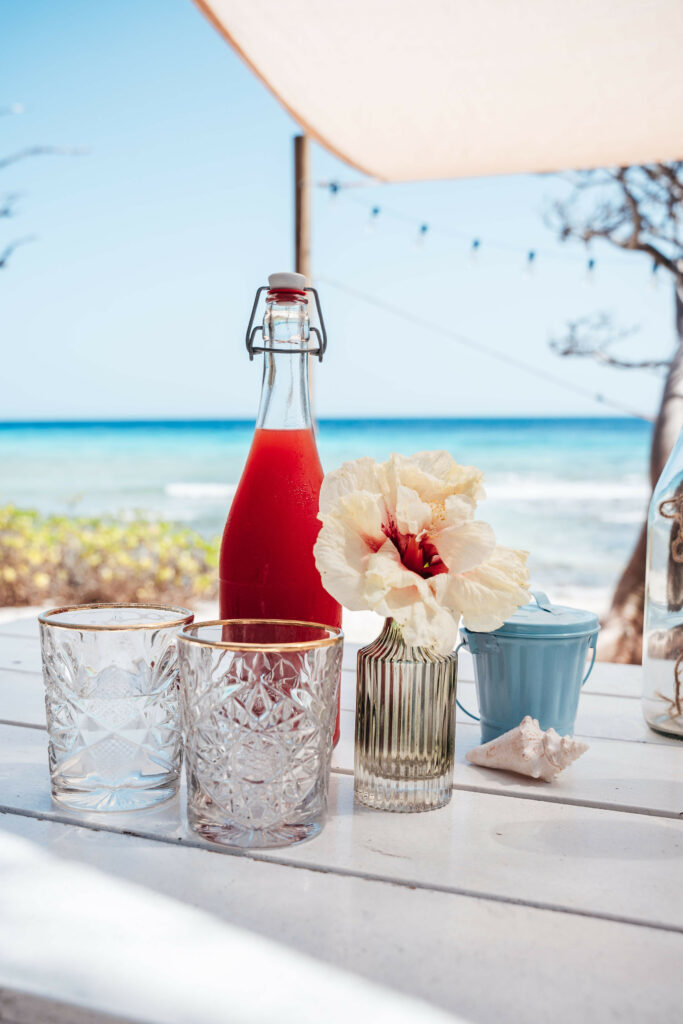 Drinking set-up on table at beach