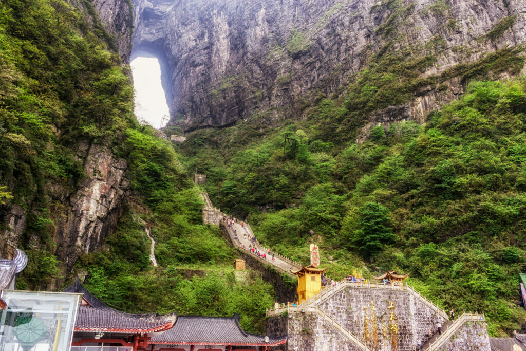 tianmen cave or heavens door. a large water eroded hole between the two peaks. Taken in tianmen mountain national park in zhangjiajie, china