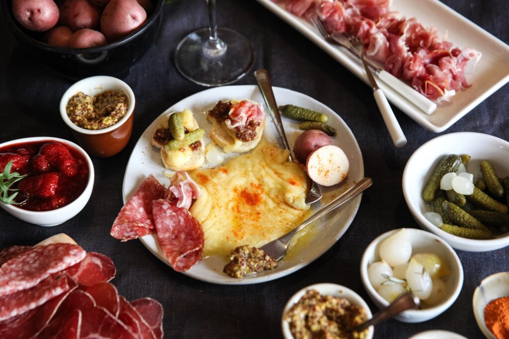 Melted cheese and charcuterie at Fireside Dining Deer Valley