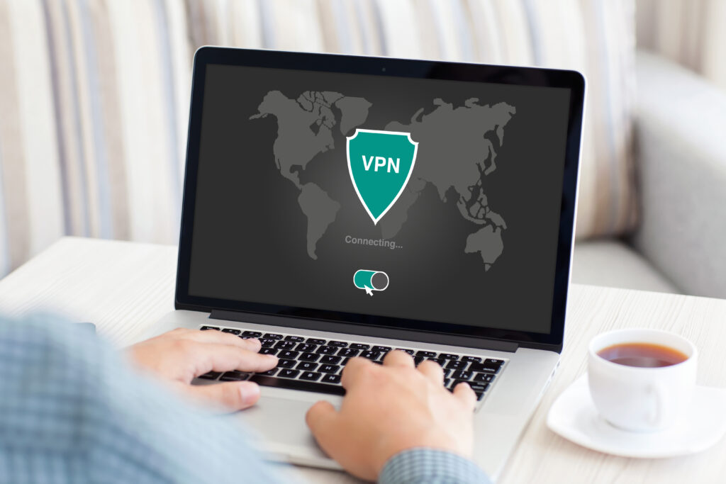 man holding notebook with app vpn creation Internet protocols for protection private network