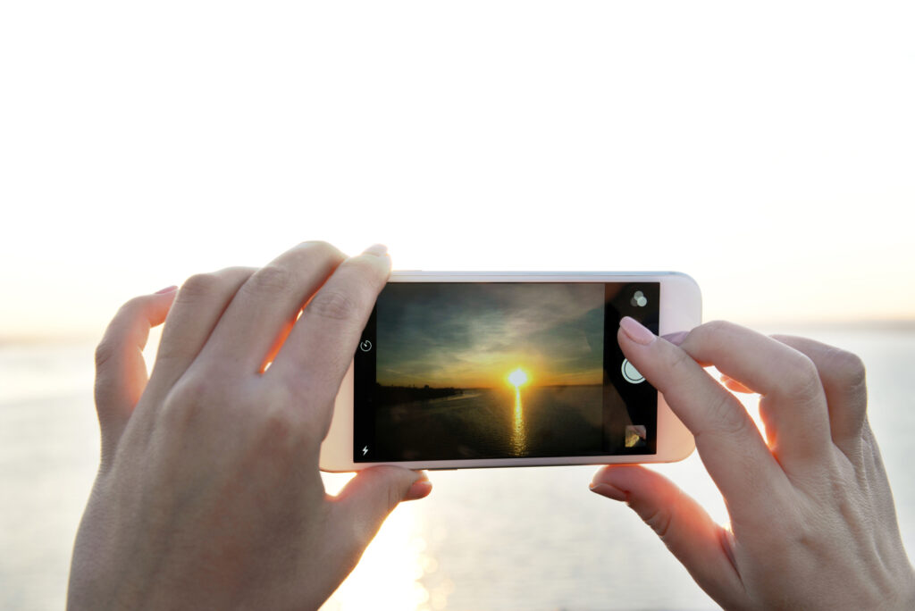 Person Using Cell Phone Camera Best Camera Phones (Winter 2024) | Top