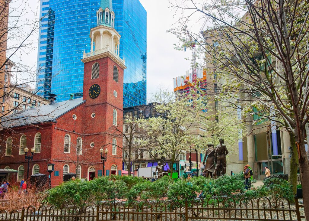 Old South Meeting House in downtown Boston, MA, the United States. People on the background